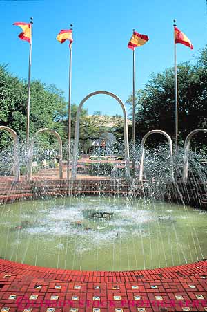 Stock Photo #15205: keywords -  alabama and flag flags fountain mobile plaza plazas public region south southern spanish vert water