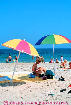 Stock Photo #15253: keywords -  atlantic beach beaches coast coastal color delaware horizon hot leisure ocean park people play playing relax relaxation relaxed relaxing sand seashore shore shoreline sky state summer sunbath sunbathers sunbathing sunny sunshine umbrella umbrellas vacation vacationers vacationing vert