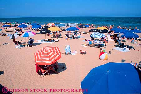 Stock Photo #18176: keywords -  atlantic beach beaches coast coastal delaware horz hot ocean people person rehoboth sand sea seashore shore summer sunny sunshine umbrellas vacation vacationing warm water