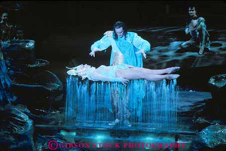 Stock Photo #15498: keywords -  act acts floats horz magic magical magically magician mysterious mystery people perform performance performer performing show showing shows sprays water woman