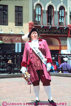 Stock Photo #15549: keywords -  announce announcer announces announcing costume costumed costumes crier outdoor outfit outside pennsylvania people perform performer performers performs person pittsburgh portray portraying portrays public speak speaker speaking speaks town vert woman