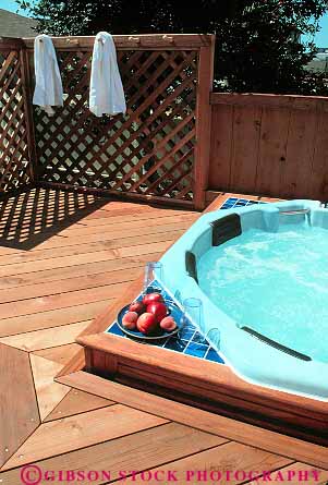 Stock Photo #15773: keywords -  comfort comfortable deck decks decoration hot jacuzi new outdoor outside people pool redwood relax relaxed relaxes soak soaking soothes soothing spa spas therapy tub tubs vert warm water with wood wooden