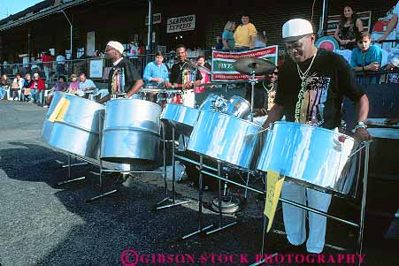 Stock Photo #15821: keywords -  african american black cultural culture drum drummer drummers drumming drums ethnic horz instrument instruments marketplace men metal minority music musical musician musicians people percussion perform performance performer performers person play player plays shiny show showing shows sound spokane state steel washington