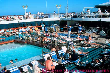 Stock Photo #15902: keywords -  america crowd crowded crowds cruise cruises cruising deck group groups horz hot island leisure liner of passenger passengers people person pool recreation relax relaxed relaxing sail sails ship ships skin star sunbath sunbather sunbathers sunbathing sunny sunshine tan tanning travel travelers tropic tropical tropics vacation vacationers vacationing vacations warm