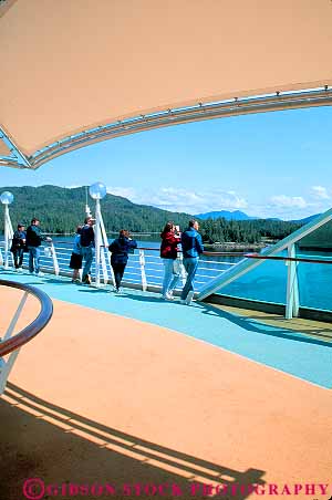 Stock Photo #15906: keywords -  crowd crowded crowds cruise cruises cruising group groups leisure liner looking of over passenger passengers people person rail recreation relax relaxed relaxing rhapsody sail sails seas ship ships sunny sunshine travel travelers vacation vacationers vacationing vacations vert