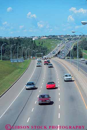 Stock Photo #16056: keywords -  alberta auto automobiles autos canada car cars country countryside divided drive drives driving edmonton elevate elevated forest freeway freeways green greenbelt highway highways hill hills hwy interstate landscape open overhead overview parkway pavement road roads route routes rural scenery scenic space street streets system terrain traffic transport transportation travel vehicles vert view views