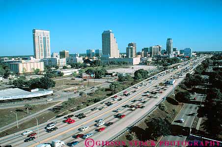 Stock Photo #16061: keywords -  auto automobiles autos buildings busy car cars center cities city cityscape cityscapes commute commuter commuters commuting congested congestion crowd crowded divided downtown drive drives driving elevate elevated florida freeway freeways high highway highways horz hour hwy interstate landscape lots many modern multitude new numerous office orlando overhead overview parkway pavement rise road roads route routes rush scenery scenic skyline skylines slow street streets system terrain traffic transport transportation travel vehicles view views