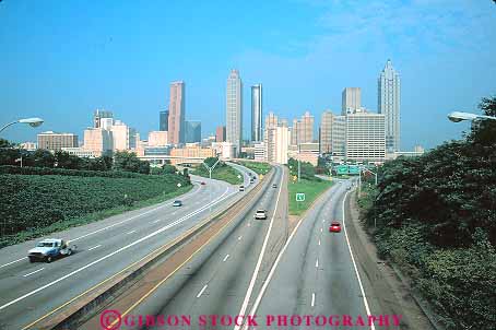 Stock Photo #16063: keywords -  atlanta auto automobiles autos buildings car cars center cities city cityscape cityscapes divided downtown drive drives driving elevate elevated exit exits freedom freeway freeways georgia high highway highways horz hwy interstate modern new office overhead overview parkway pavement pkwy rise road roads route routes sign signs skyline skylines street streets system traffic transport transportation travel vehicles view views