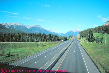 Stock Photo #16064: keywords -  above alberta almost auto automobiles autos banff canada car cars divided drive drives driving elevate elevated empty freeway freeways highway highways horz hwy interstate landscape mountain mountains overhead overview pavement road roads rocky route routes scenery scenic street streets system transport transportation travel vehicles view views