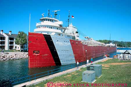 Stock Photo #16140: keywords -  big channel charlevoix close coal commercial freighter giant great horz huge industry lakes large look looking michigan move moves moving ocean people person region sea see seeing ship shipping ships state tankers through transportation transporting watching