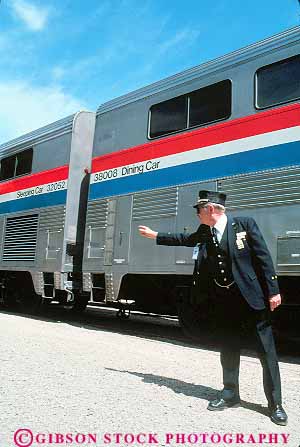 Stock Photo #16250: keywords -  career cars conductor conductors directing job jobs man men occupation passenger passengers people person railroad railroading railroads released train trains transportation traveler travelers traveling travels vacation vert work worker working works