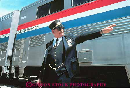 Stock Photo #16251: keywords -  career cars conductor conductors directing horz job jobs man men occupation passenger passengers people person railroad railroading railroads released train trains transportation traveler travelers traveling travels vacation work worker working works