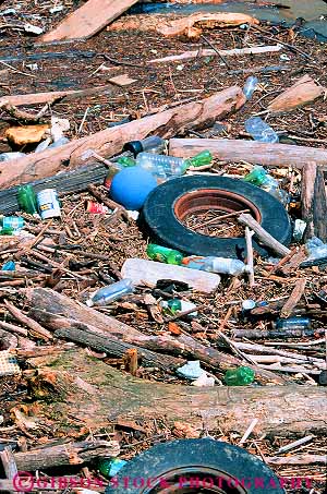 Stock Photo #17607: keywords -  cincinnati debris disposal ecology environment environmental float floating floats litter ohio river shore trash ugly unsightly vert waste wastes with wood