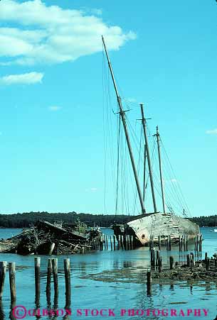 Stock Photo #16404: keywords -  abandon abandoned aged aging boat boats collapse collapsed collapses collapsing crumble crumbles crumbling decay decayed decaying decays desert deserted deteriate deteriated deteriates deteriating empty forgotten forlorn maine mast masts mud old older oldest schooner ship ships shore stuck vert wiscasset