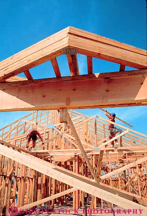 Stock Photo #13809: keywords -  board boards build builders building carpenter carpenters construction frame frames framing home homes house houses lumber man men new residence residential summer truss trusses vert wood wooden work worker workers working