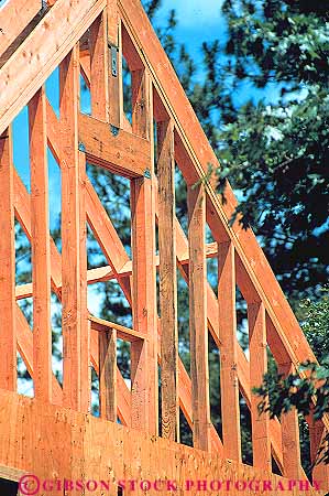 Stock Photo #13812: keywords -  board boards build building construction frame frames framing home homes house houses lumber new residence residential roof roofs shape shaped slope slopes sloping triangle triangles triangular vert window wood wooden
