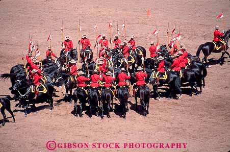 Stock Photo #16633: keywords -  alberta authority calgary canada canadian career demonstrate demonstrates demonstrating display displaying displays employee employees enforced enforcement enforces enforcing entertain entertainment entertains force form formation formations forming forms group groups handle handles handling horse horsemanship horses horz job jobs law local lots many mount mounted mountie mounties mounty multitude municipal numerous occupation occupations officer officers official patrol patrolling patrolman patrols people perform performance performing performs person police policeman policemen public red safe safety security servant service show showing shows stampede tradition traditional uniform uniformed uniforms vocation work worker workers working works