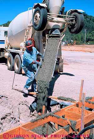 Construction Industry Pouring Concrete From Cement Truck Chute