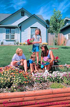 Stock Photo #16671: keywords -  child children cultivate cultivates cultivating female garden gardening gardens girl girls grow growing home house kid kids mother outdoor outdoors outside parent parents people person plant planting plants recreation released spring summer vert with woman yard young youth