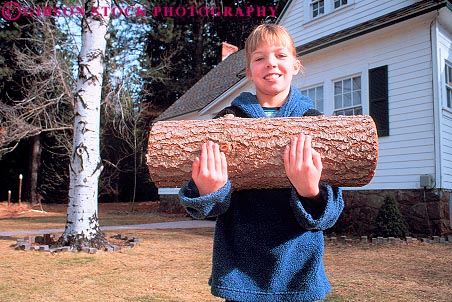 Stock Photo #16688: keywords -  arm arms carried carries carry carrying child children cylinder cylindrical firewood girl girls hands hold holding holds horz kid kids log logs outdoor outdoors outside people person released round section wood young youth