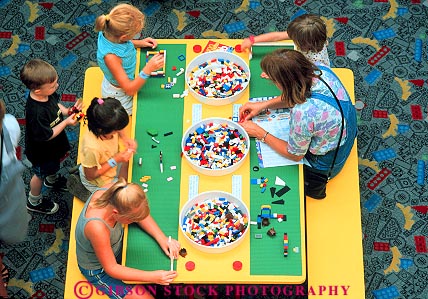 Stock Photo #16698: keywords -  (near american assemble assembling blocks bloomington boy boys center child children colorful enclosed fit fits game games girl girls horz imagination indoor indoors inside kid kids lego mall malls minneapolis) minnesota of people person recreation table tables together young youth