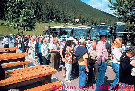 Stock Photo #16872: keywords -  age aged alberta array banff bus buses canada citizen citizens countless crowd crowded crowding crowds elder elderly elders group groups horz in individual individuals large line lines lots many mature number numerous of old older people person recreation row rows senior stand standing stands tight together tour touring tourist tourists tours travel traveler travelers traveling vacation wait waiting waits