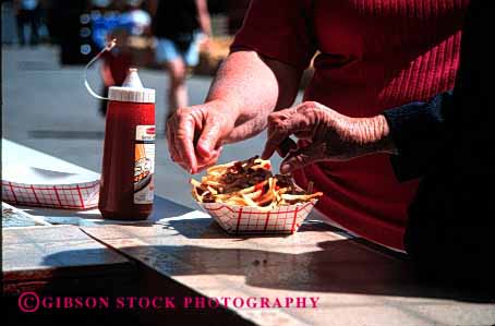 Stock Photo #2643: keywords -  eat food french fries horz junk nutrition people poor