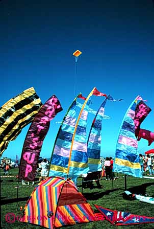 Stock Photo #2795: keywords -  aerodynamic aerodynamics air banners blow color colorful colors design engineer festival flight fly flying geometric geometrical geometry kite lift lifted lifts lightweight material row rows sky soar string style synthetic vert wind