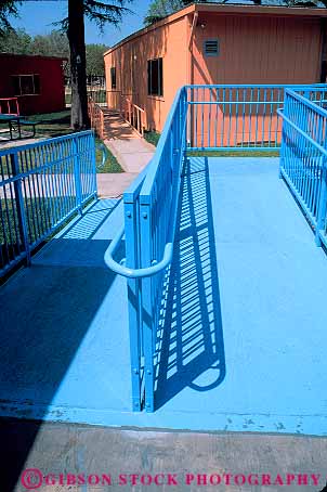 Stock Photo #15974: keywords -  access accesses approach approaches approaching blue building disabilities disability disable disabled entrance geometric geometrical geometry handicap handicapped handicaps line linear lines metal modern need needs parallel pattern patterns rail railing ramp ramps slope sloped slopes special steel vert walkway walkways wheelchair wheelchairs