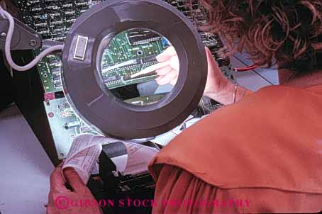 Stock Photo #5254: keywords -  career close closely computer detail electric electrical electricity employee enlarge equipment exact high horz industry job lens light lighted look magnifier magnify magnifying manufacture manufacturing occupation precise precision research science see tech technical technician technicians technology test testing tool use view vision vocation woman work worker working